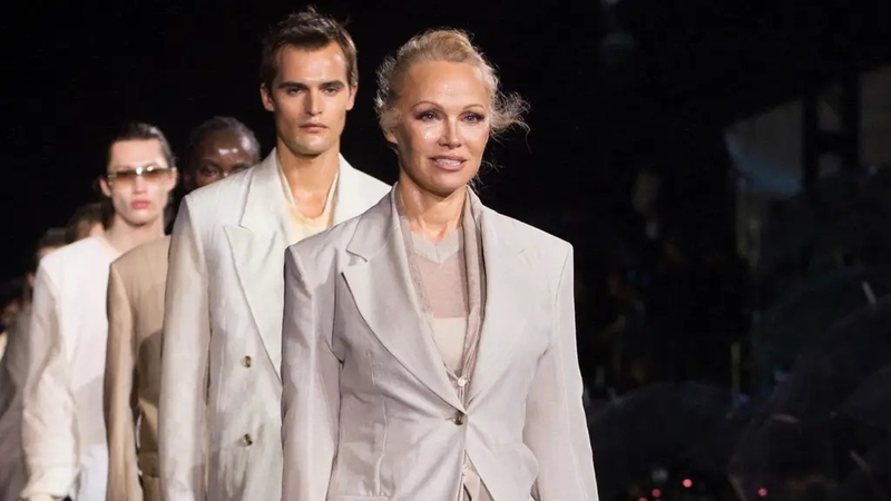 They were joined on the windswept catwalk by DJ Khaled.