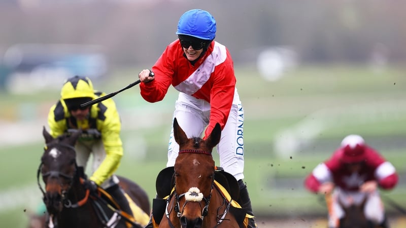 Racheal Blackmore crossing the line with a fast-finishing Shishkin behind