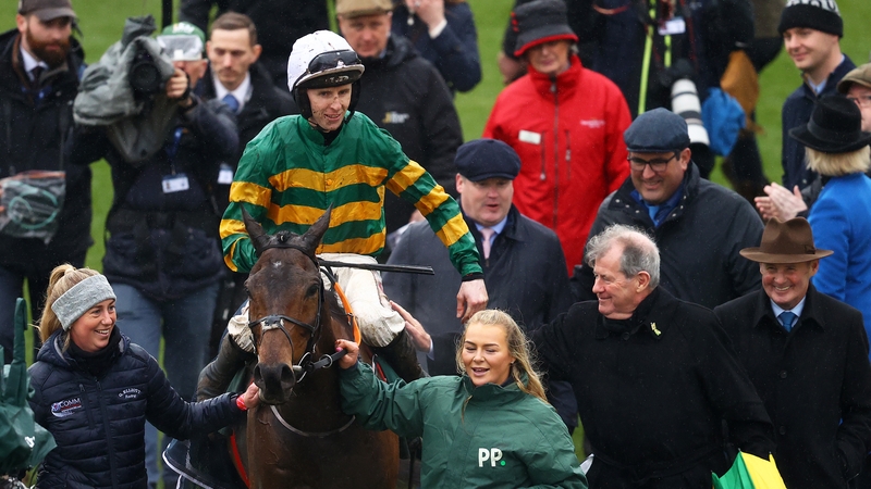 Mark Walsh celebrates on board Sire Du Berlais and alongside owner JP McManus and trainer Gordon Elliott