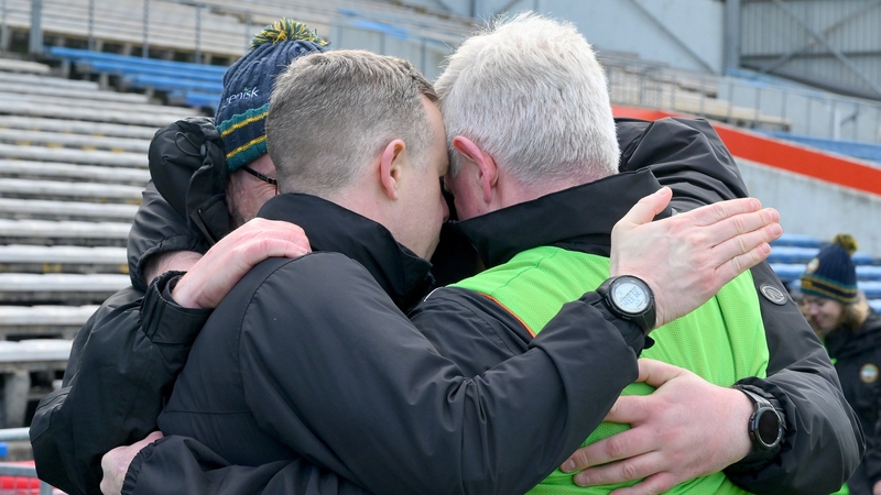 Offaly manager Martin Murphy, in the green vest, and his selectors take a moment to remember Liam Kearns after the game