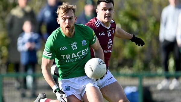 Fermanagh forward Ultan Kelm is tracked by David Lynch of Westmeath