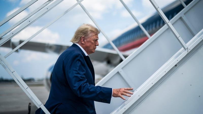 Former US President Donald Trump boards his plane in Florida last Monday
