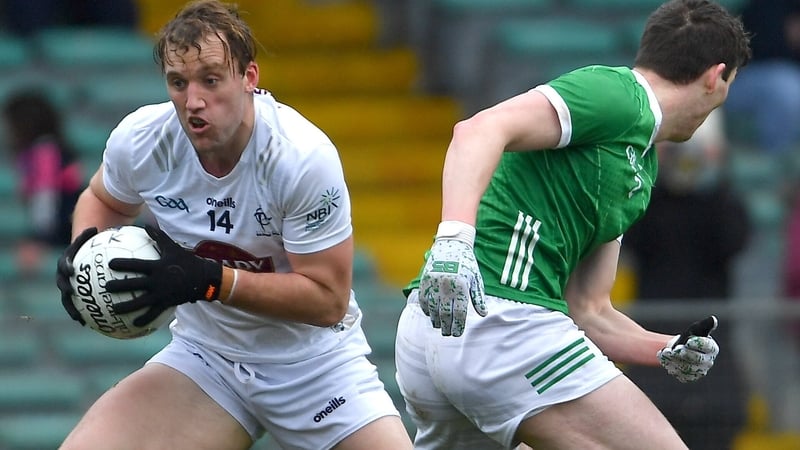 Darragh Kirwan evades Michael Donovan