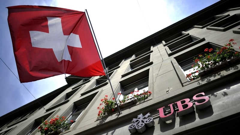 Third-quarter net profit at Swiss bank UBS surged 74% - comfortably beating expectations