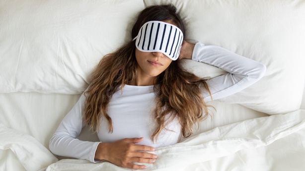 Man sleeping in bed