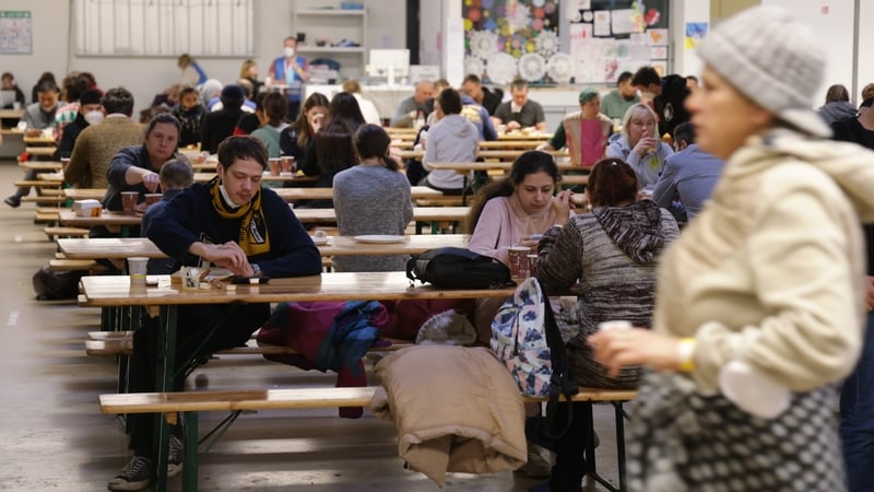 Refugees from Ukraine at a refugee registration centre in Berlin, December 2022
