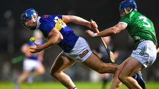 Jason Forde of Tipperary evades Mike Casey
