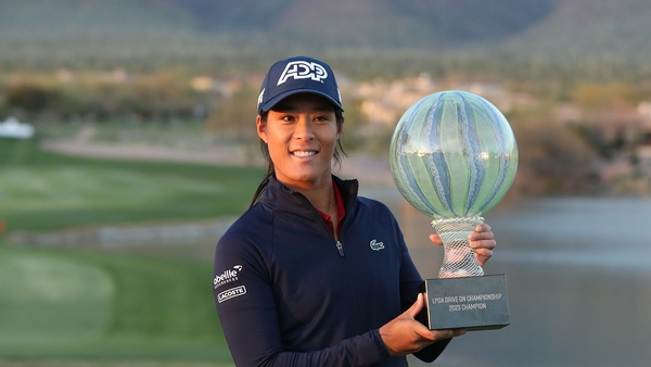 Celine Boutier with the trophy