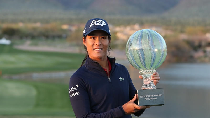 Celine Boutier with the trophy