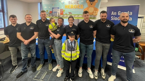 Little Blue Heroes Josh O'Hagan and Roisin Conway with gardaí in Drogheda