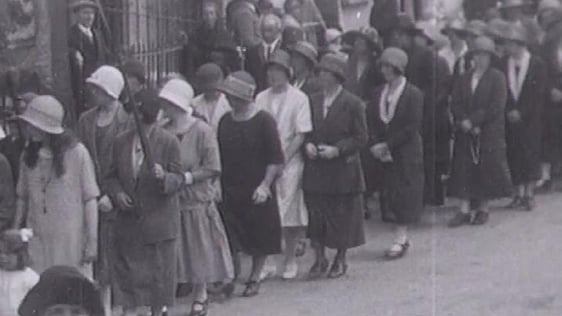 Youghal locals in all their finery after attending church