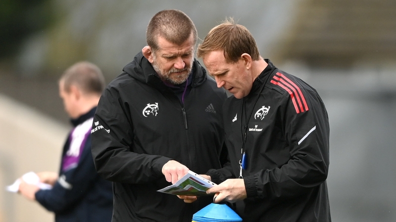 Graham Rowntree (left) speaks to his assistant coach Mike Prendergast (right) at Munster's training session at Thomond Park