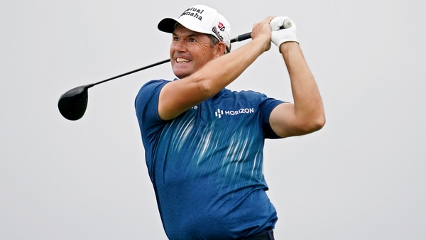 Padraig Harrington of Ireland plays his shot from the 11th tee