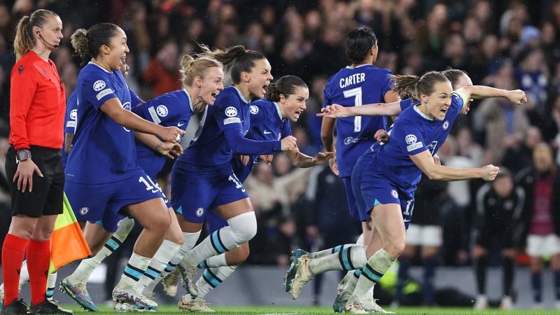Chelsea players celebrate their shootout win at Stamford Bridge