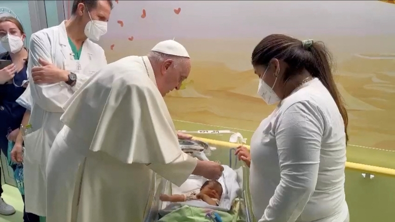 Pope Francis baptises a baby boy called Miguel Angel at Rome's Gemelli hospital