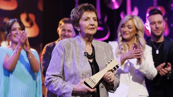 Margo with her Hall of Fame award
