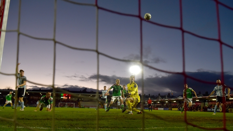 Cork City goalkeeper Jimmy Corcoran watches as the deflected ball sails in towards the net
