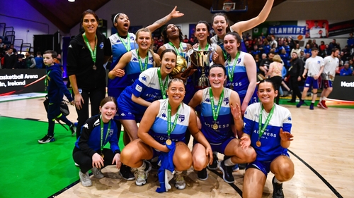 The Address UCC Glanmire players celebrate with the cup