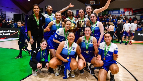 The Address UCC Glanmire players celebrate with the cup