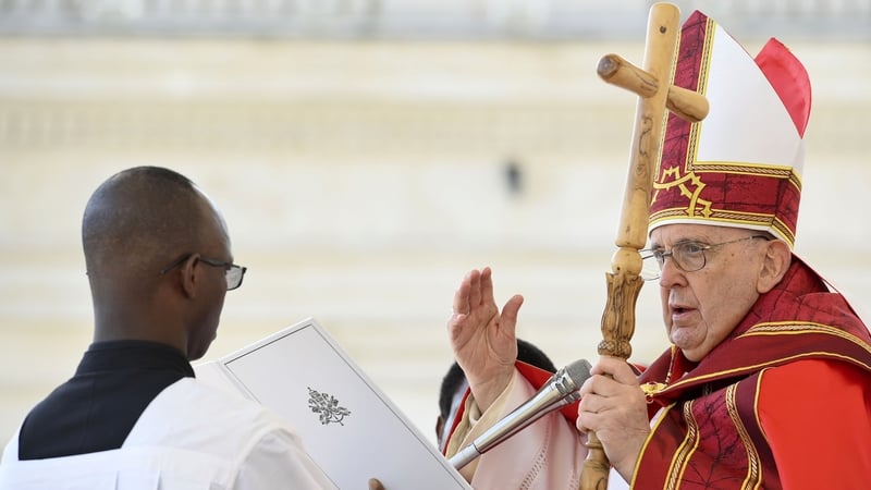 Pope Francis delivers his blessing at St Peter's Square during the Palm Sunday mass