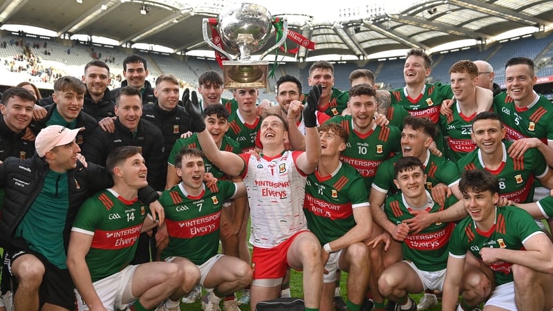 Mayo players celebrate with the cup
