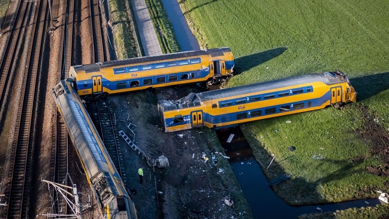 The double-decker train veered off the tracks near the village of Voorschoten before ending up partly in a field