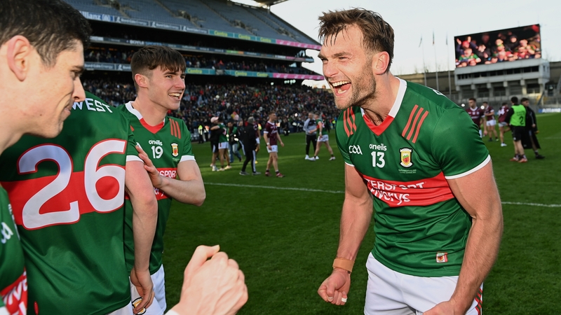 Aidan O'Shea (R) celebrates with team-mates after Mayo's league final win