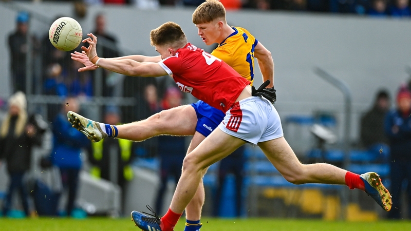 Tommy Walsh of Cork attempts to block Clare's Dermot Coughlan during the counties' Division 2 clash in Ennis