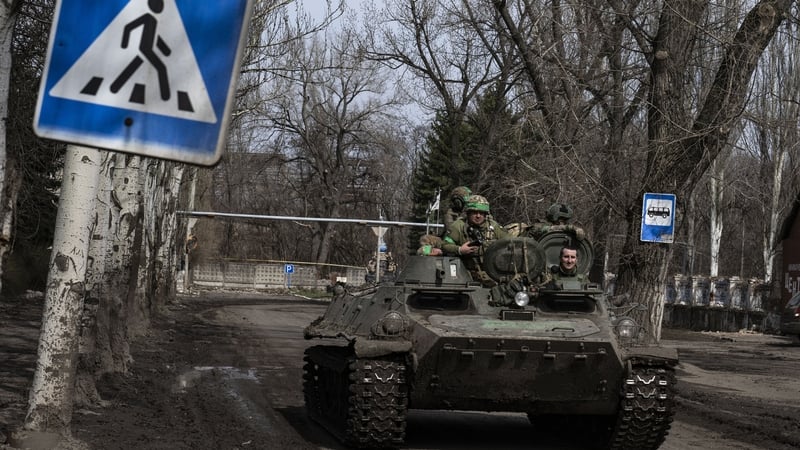 Ukrainian soldiers drive a tank amid Russia-Ukraine war on the frontline of Donetsk Oblast