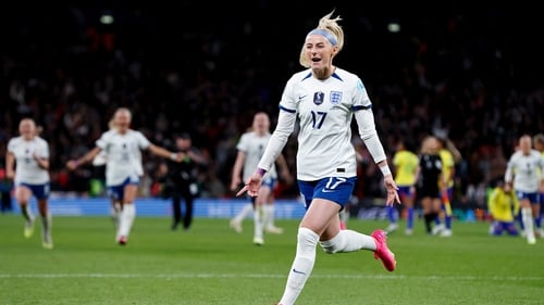 Chloe Kelly celebrates her winning kick