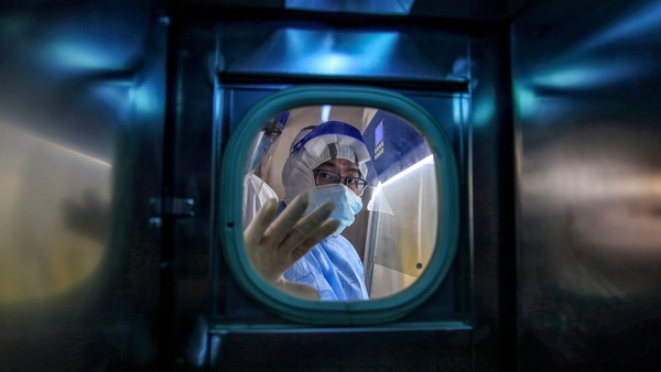 A medical staff member inside an isolation ward at Red Cross Hospital in Wuhan in March 2020