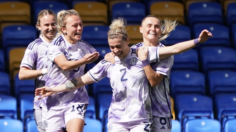 Nicola Docherty is mobbed after her goal