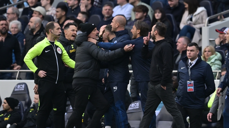 Brighton manager Roberto De Zerbi (R) gestures during the Premier League match between Tottenham Hotspur