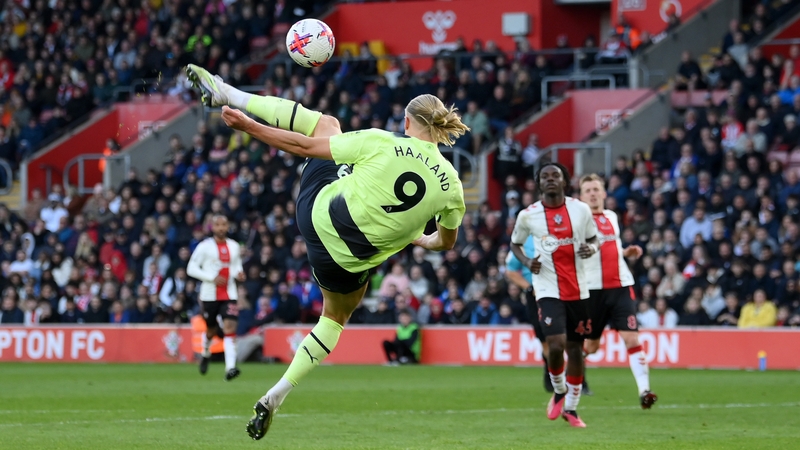 Erling Haaland acrobatically fires home his second, and City's third