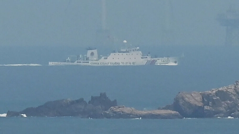 A China Coast Guard ship sails towards the zone where China said it conducted exercises