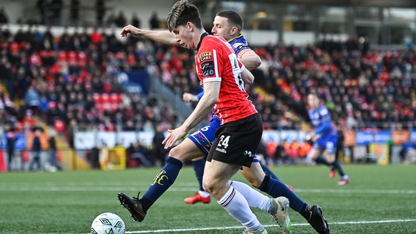 Ollie O'Neill of Derry City in action against Keith Buckley of Bohemians