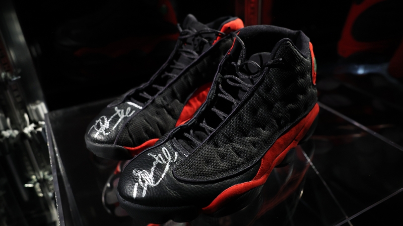 Michael Jordan signed the shoes after the game and gave them to a ballboy