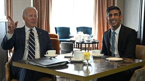 Joe Biden said he was there to "listen" as he had a cup of tea with Prime Minister Rishi Sunak