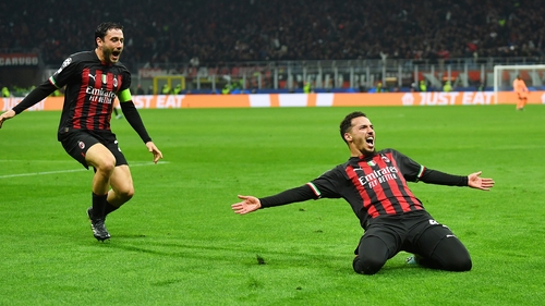 AC Milan captain Davide Calabria rushes to celebrate with goalscorer Ismael Bennacer