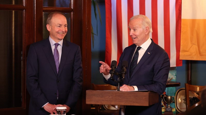 Joe Biden (right) made a speech in front of his distant relatives and other guests at The Windsor pub - with Tánaiste Micheál Martin