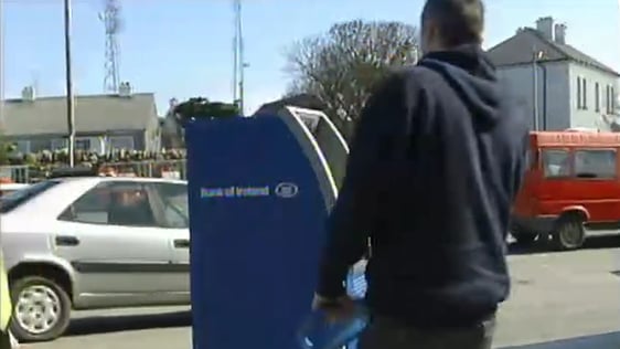 Arrival of an ATM to Elizabeth Mullen's supermarket in Kilronan, Inis Mór, Aran Islands, 2003.