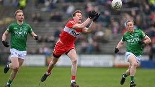 Brendan Rogers of Derry in action against Cian McManus of Fermanagh