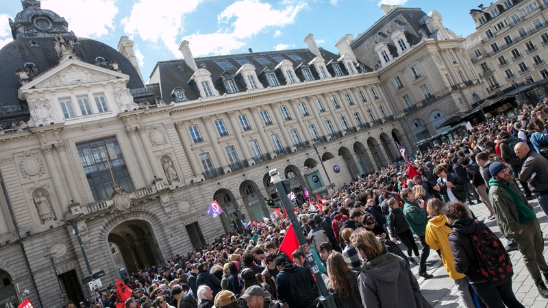 Protesters gather outside Place de la Republique to demonstrate against pension reform