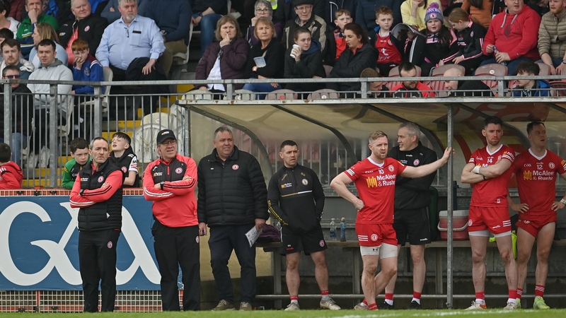 The Tyrone dugout watches their Ulster Championship come to an end for another year