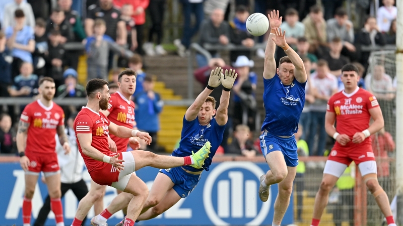 Tyrone's Padraig Hampsey tries his luck against Monaghan