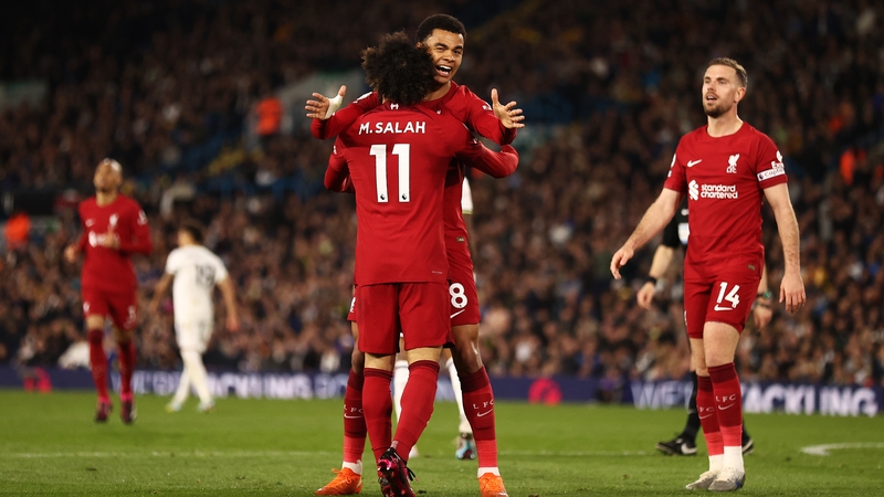 Mo Salah celebrates with team-mate Cody Gakpo after his second and Liverpool's fourth goal at Elland Road