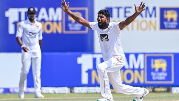 Prabath Jayasuriya celebrates one of his 10 match wickets