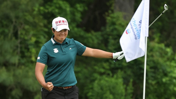 Chien Peiyun celebrates after chipping in for birdie on the eighth hole