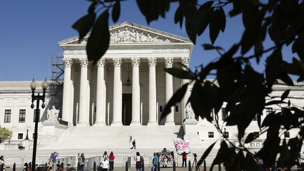 The conservative-dominated bench had been scheduled to issue a ruling by Wednesday - but it extended a stay freezing the lower court decisions for two days