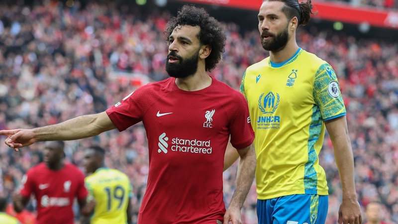 Mohamed Salah celebrates after scoring Liverpool's third goal